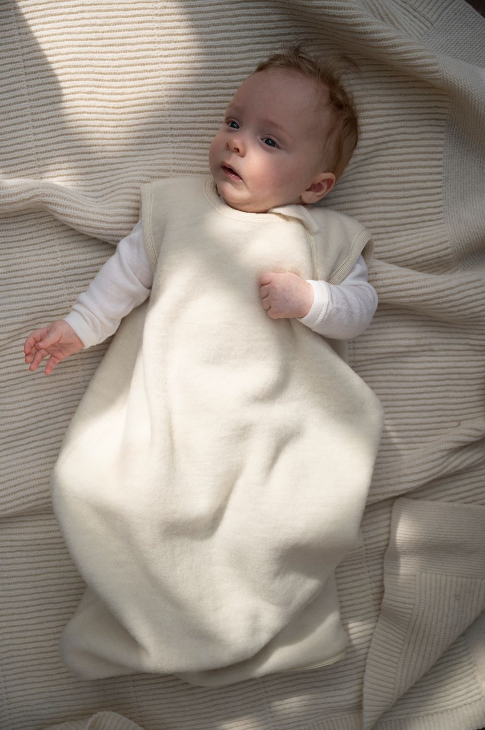 Slaapzak wolfleece naturel mouwloos Reiff voorzijde