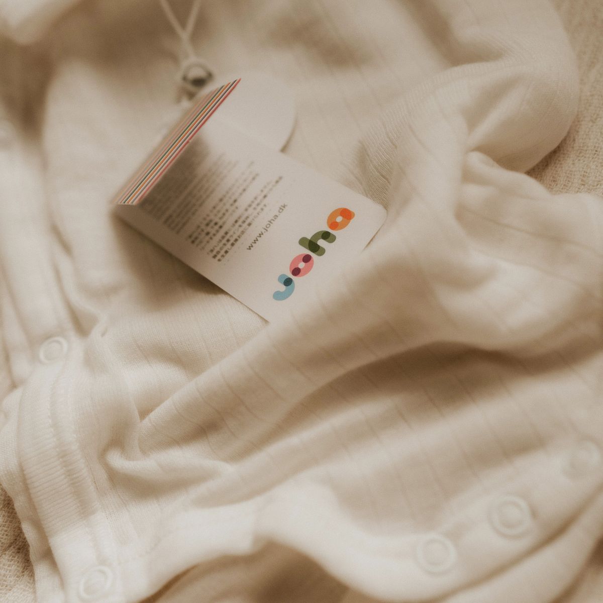 Close up Wikkelromper merino wol naturel