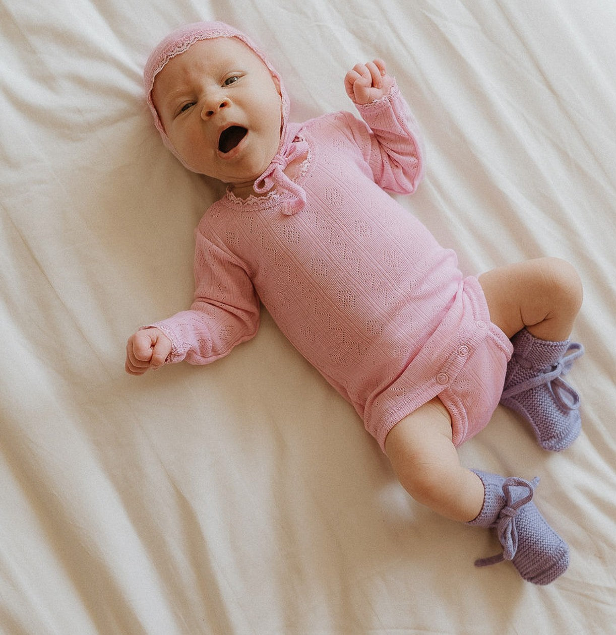 Romper rose pointelle