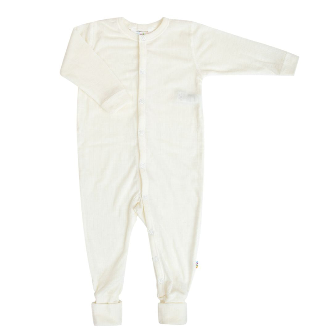 Wollen jumpsuit in de kleur naturel voor baby's van het merk Joha.