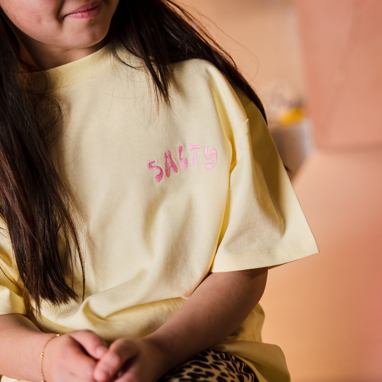 T-shirt smiley geel