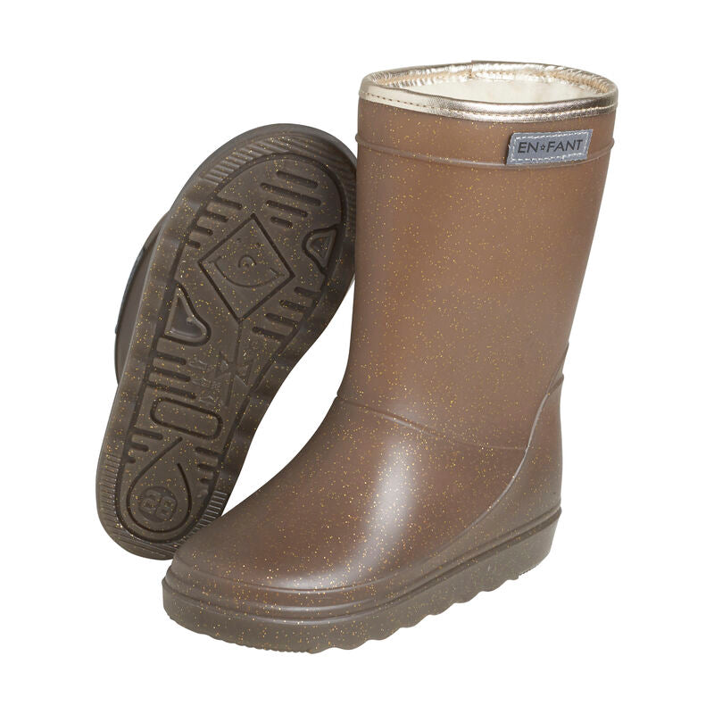 De thermoboots zijn gevoerd met wol aan de binnenzijde. De regenlaarzen zijn van ENFANT en glitter chocolate chip van kleur.