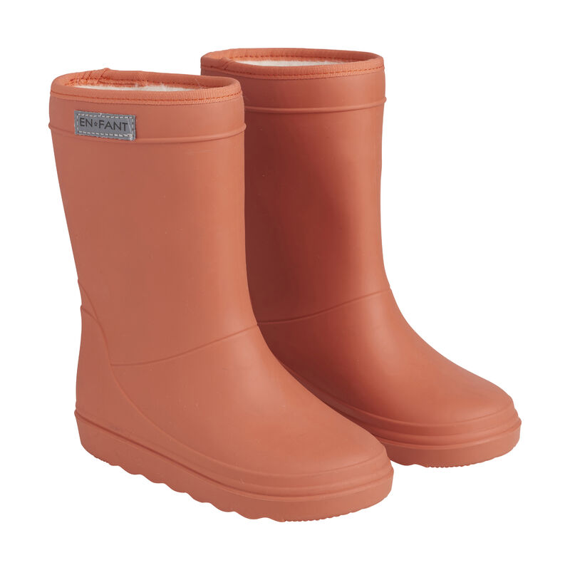 De thermoboots zijn gevoerd met wol aan de binnenzijde. De regenlaarzen zijn van ENFANT en orange rust van kleur.