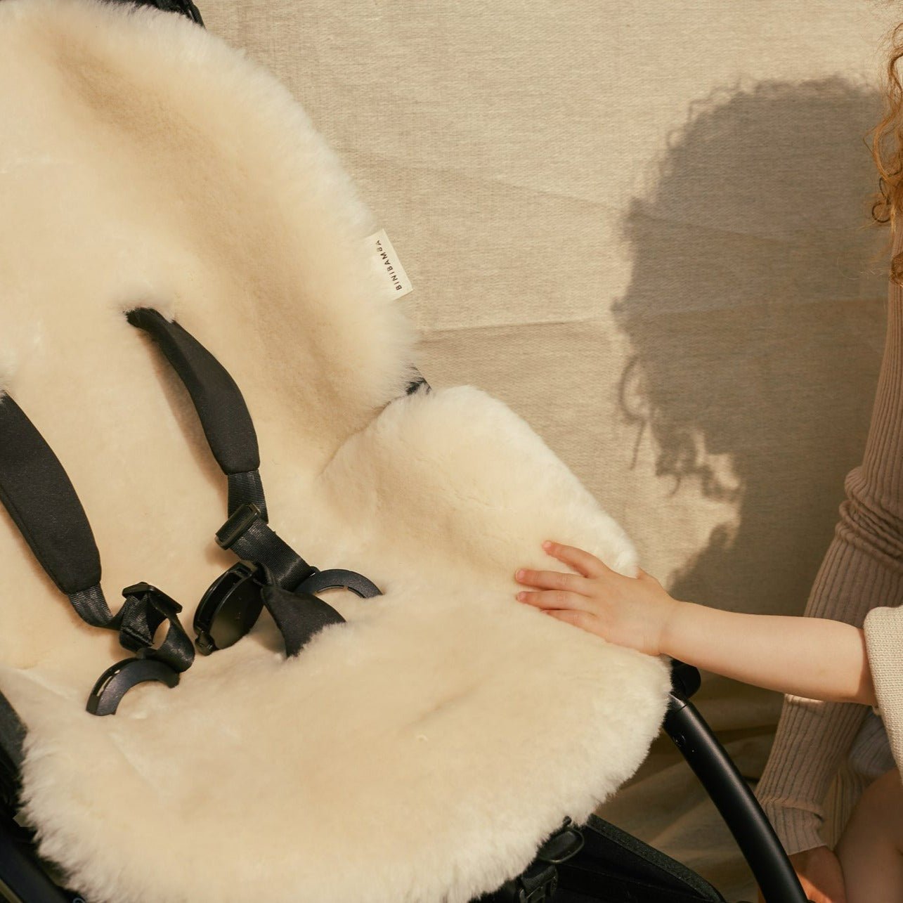 Sheepskin snuggler peanut - Charly's