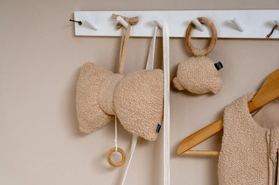 Muziekbox gemaakt van teddy stof voor baby's.