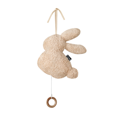Muziekbox gemaakt van teddy stof voor baby's.