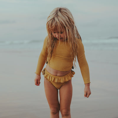 UV zwem bikini met broekje en shirt voor meisjes in de kleur geel van Donsje.