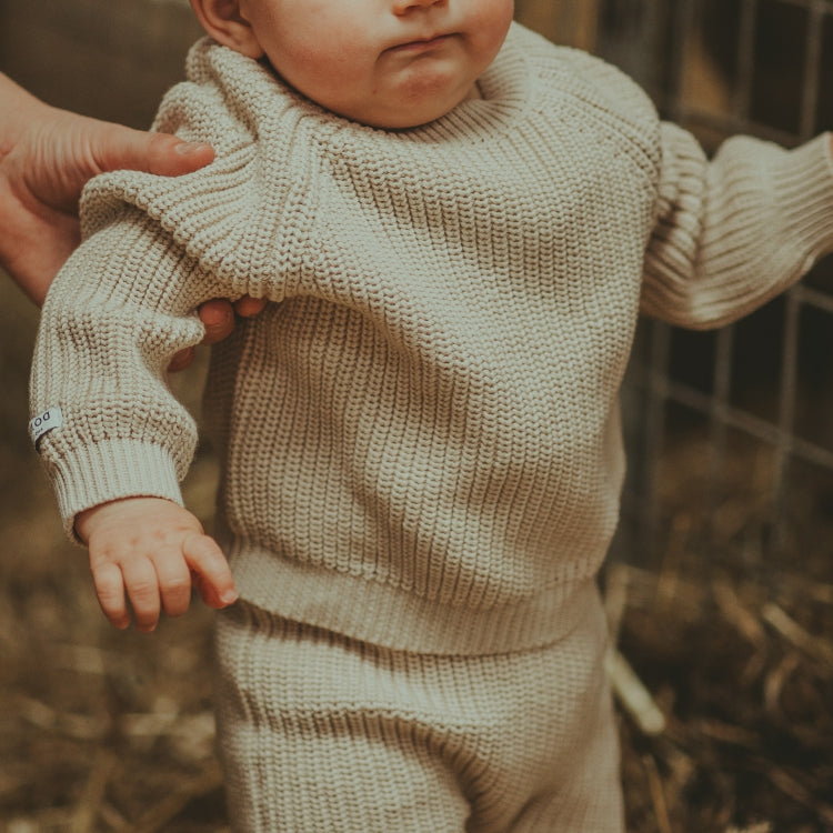 Wollen trui in de kleur champagne voor baby en kinderen van donsje 