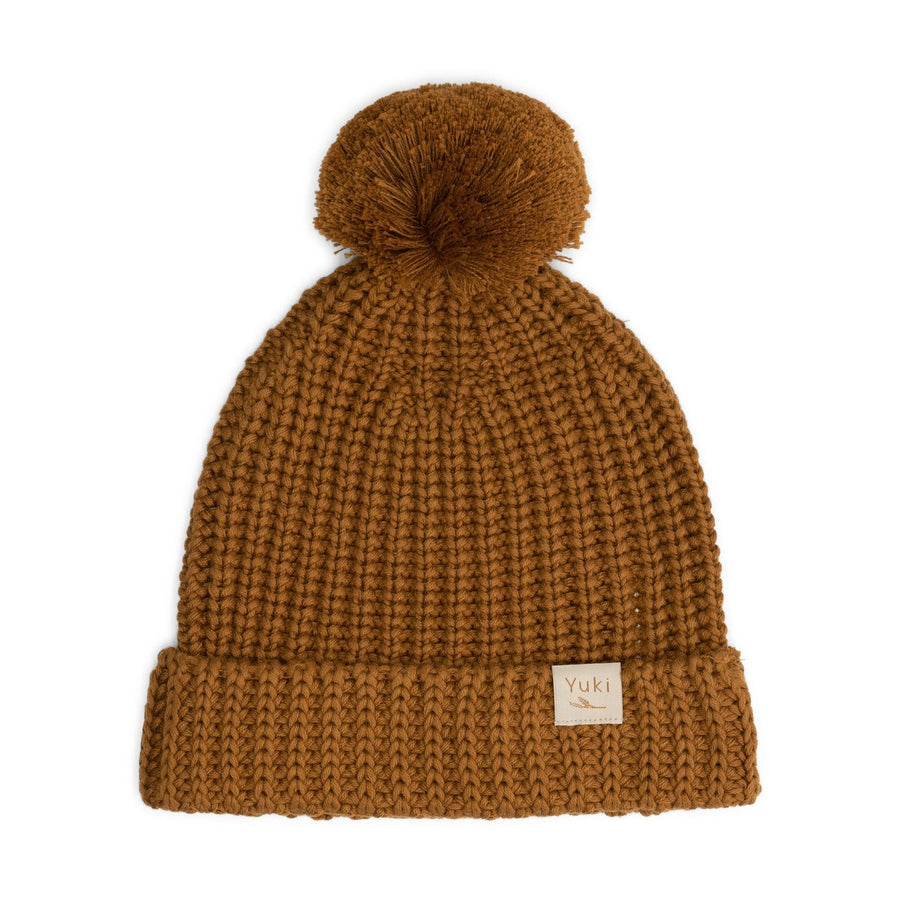 Knitted beanie met pom pom in de kleur donker rood van Yuki.