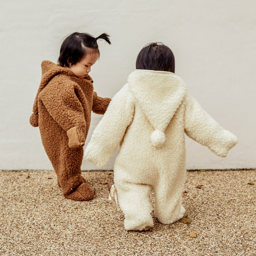 Jumpsuit voor kind gemaakt van dik schapenwol van het merk binibamba