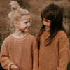Gebreide trui voor kinderen in de kleur goud van Yuki.
