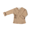 Rib vest aan voor baby's in de kleur biscuit van Nixnut.