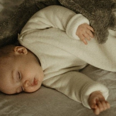 Slaapzak gemaakt van biologische merino wol fleece voor baby's en kinderen van Reiff.
